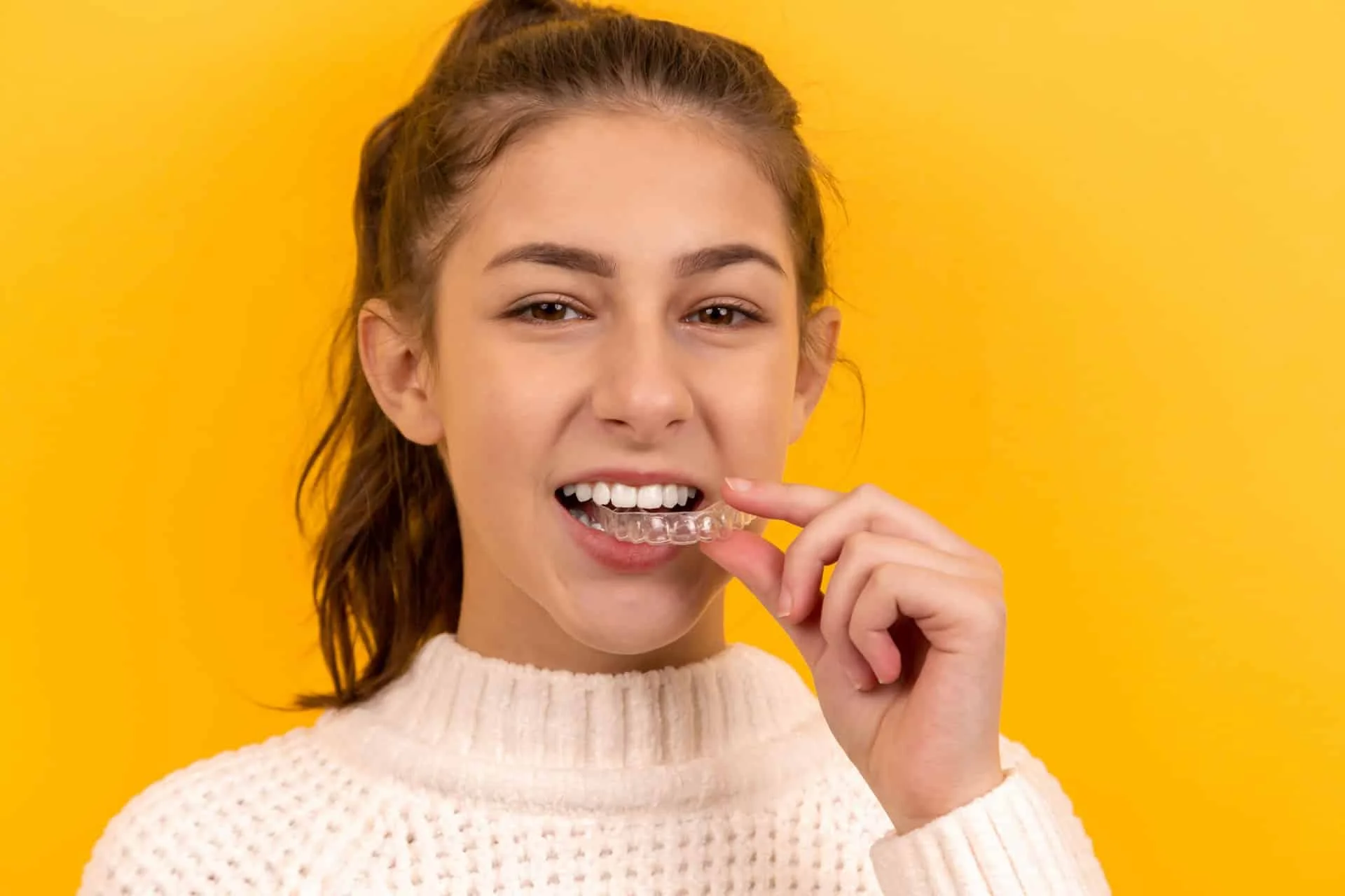 Ceramic Braces vs. Invisalign